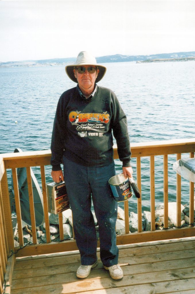 Ray Norman - staining the deck (2003)